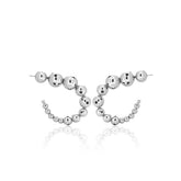 Pair of medium silver earrings featuring a curved design made of graduated metallic spheres.