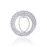 A silver beaded necklace twisted three times with a graduated design, featuring varying sphere sizes. Can be worn twisted in three different ways  for a layered look or untwisted for a sleek, minimal style.