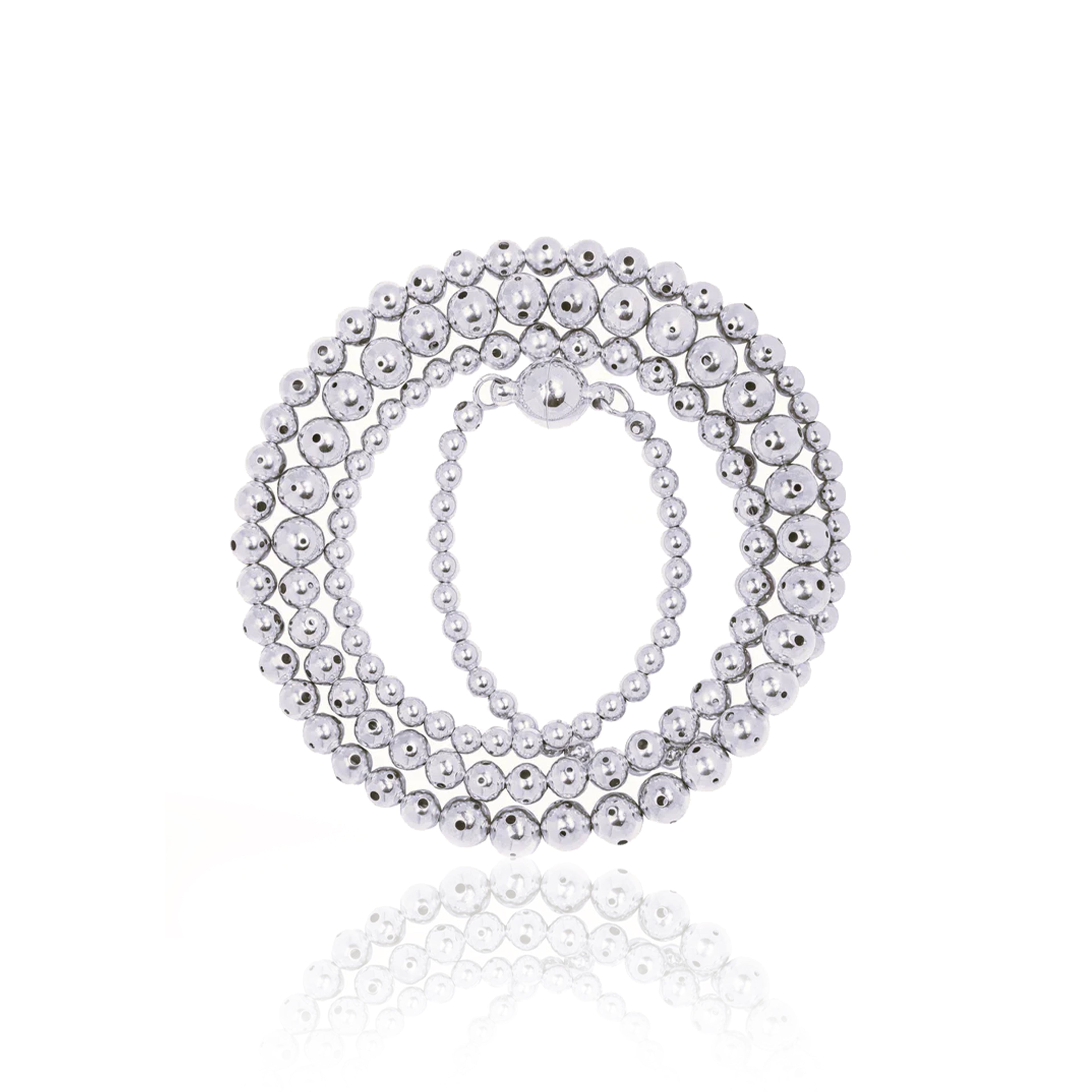 A silver beaded necklace twisted three times with a graduated design, featuring varying sphere sizes. Can be worn twisted in three different ways  for a layered look or untwisted for a sleek, minimal style.