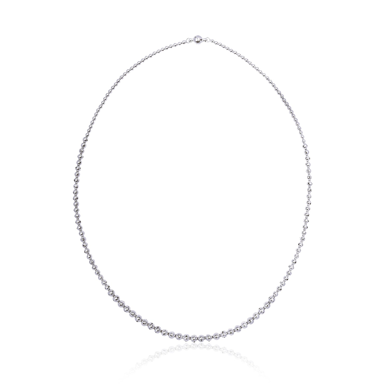 A long silver beaded necklace twisted three times with a graduated design, featuring varying sphere sizes. Can be worn twisted in three different ways  for a layered look or untwisted for a sleek, minimal style.